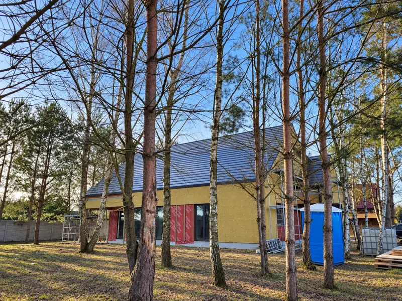 Dom z elewacją drewnianą - docieplenie ścian